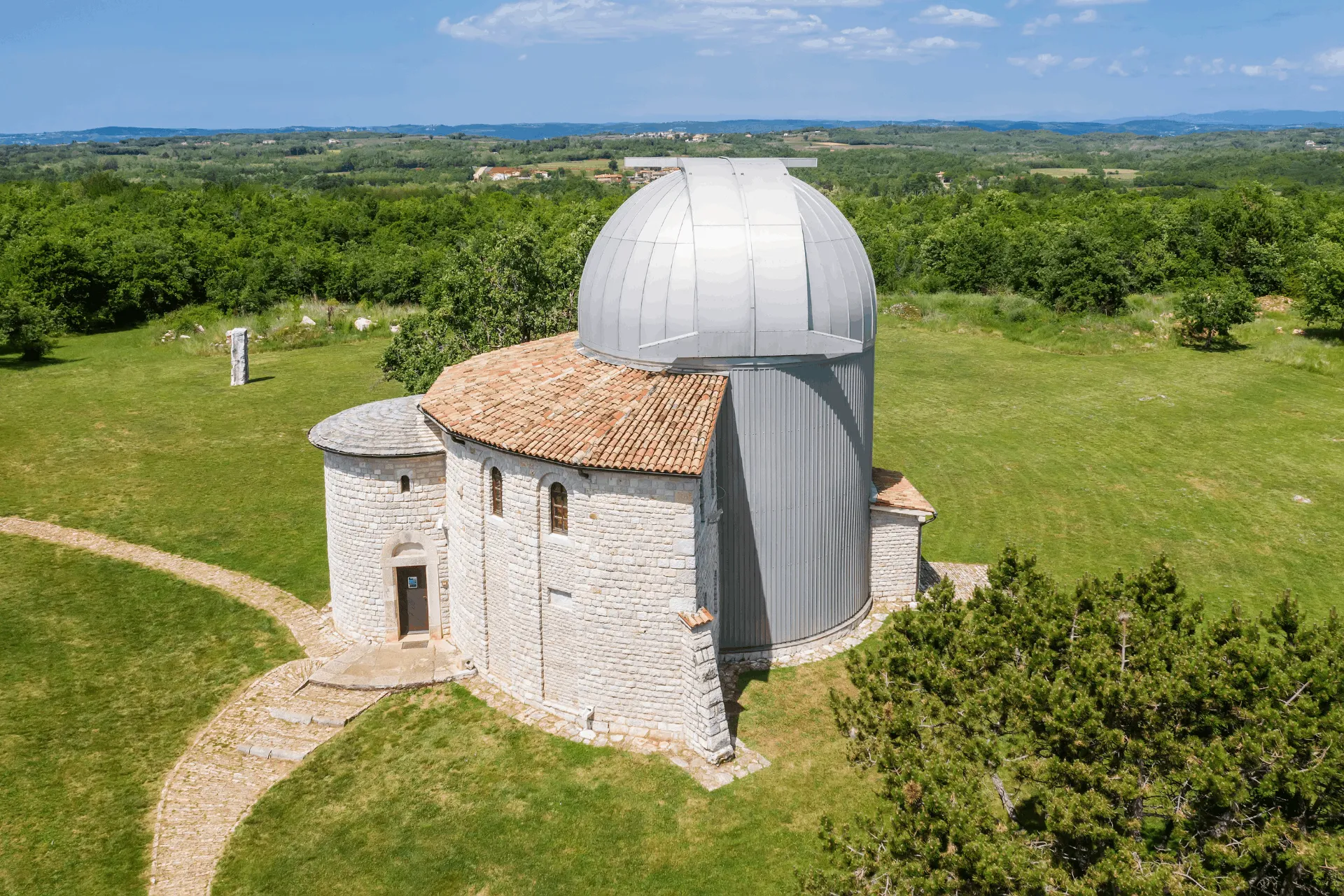 observatory building in istria surrounded by green grass